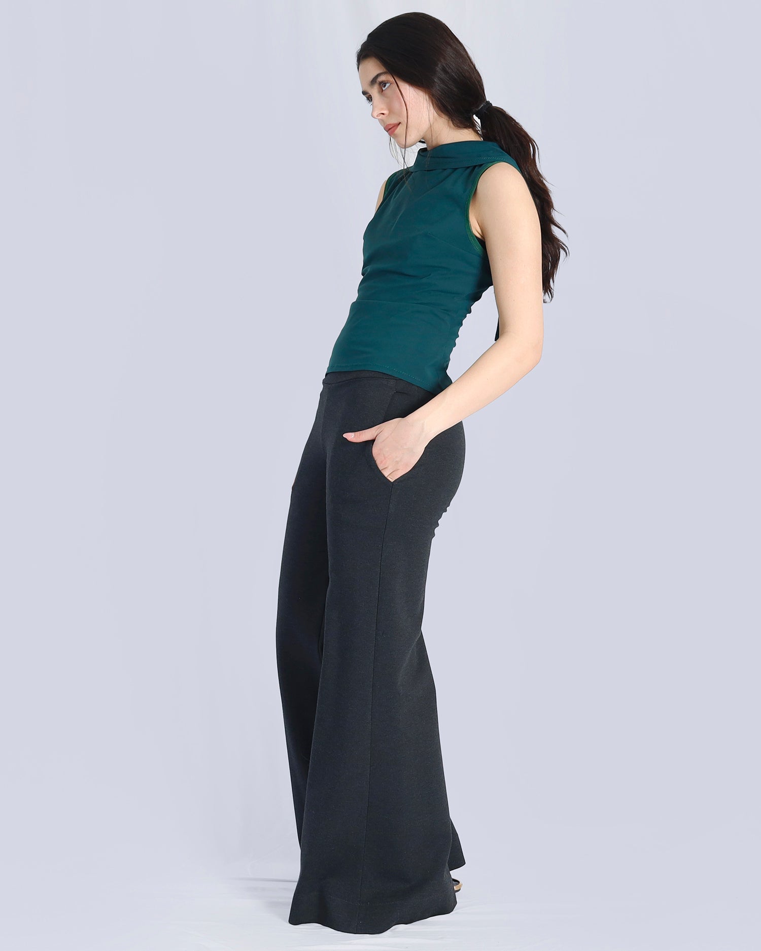 Woman wearing a green top and black pants on a white background. Maison Marie Saint Pierre | Pants | AVALON2 | Black | Top | PAYTON | Hunter 