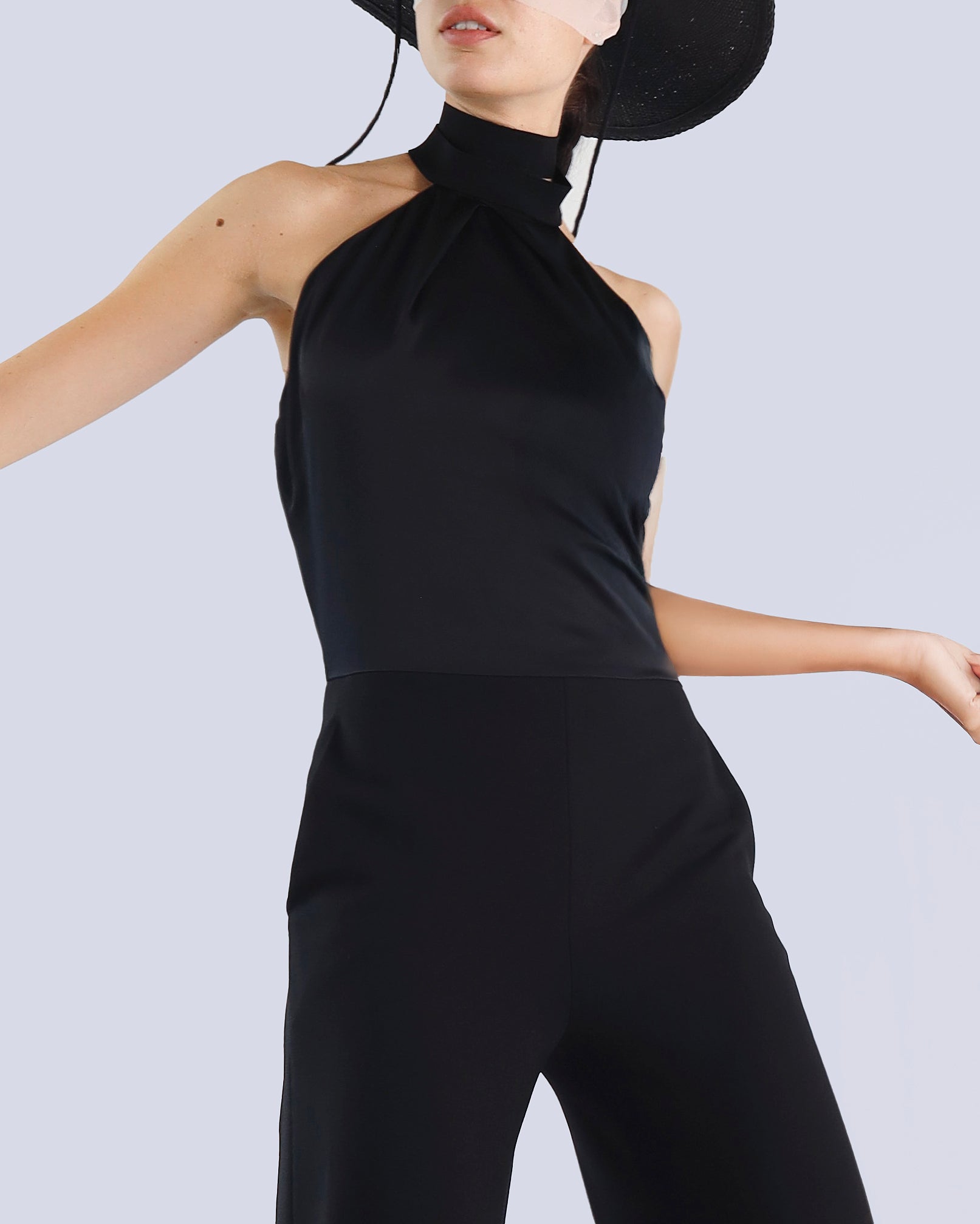 Person wearing a black sleeveless top and pants with a plain background. Maison Marie Saint Pierre | Pants | PIPPA| Black