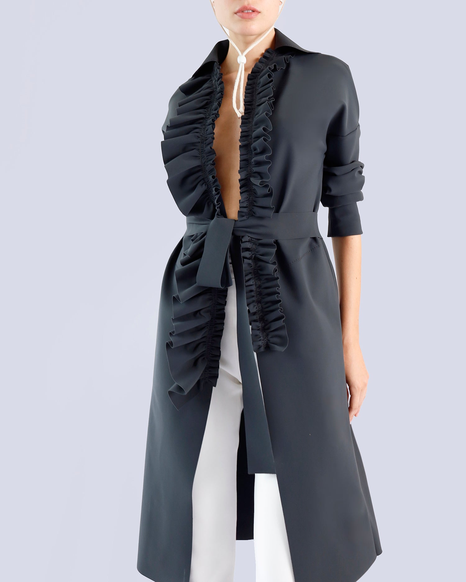 Gray ruffled coat worn by a person on a light gray background. Maison Marie Saint Pierre | Coat | PELLINAME | ANT