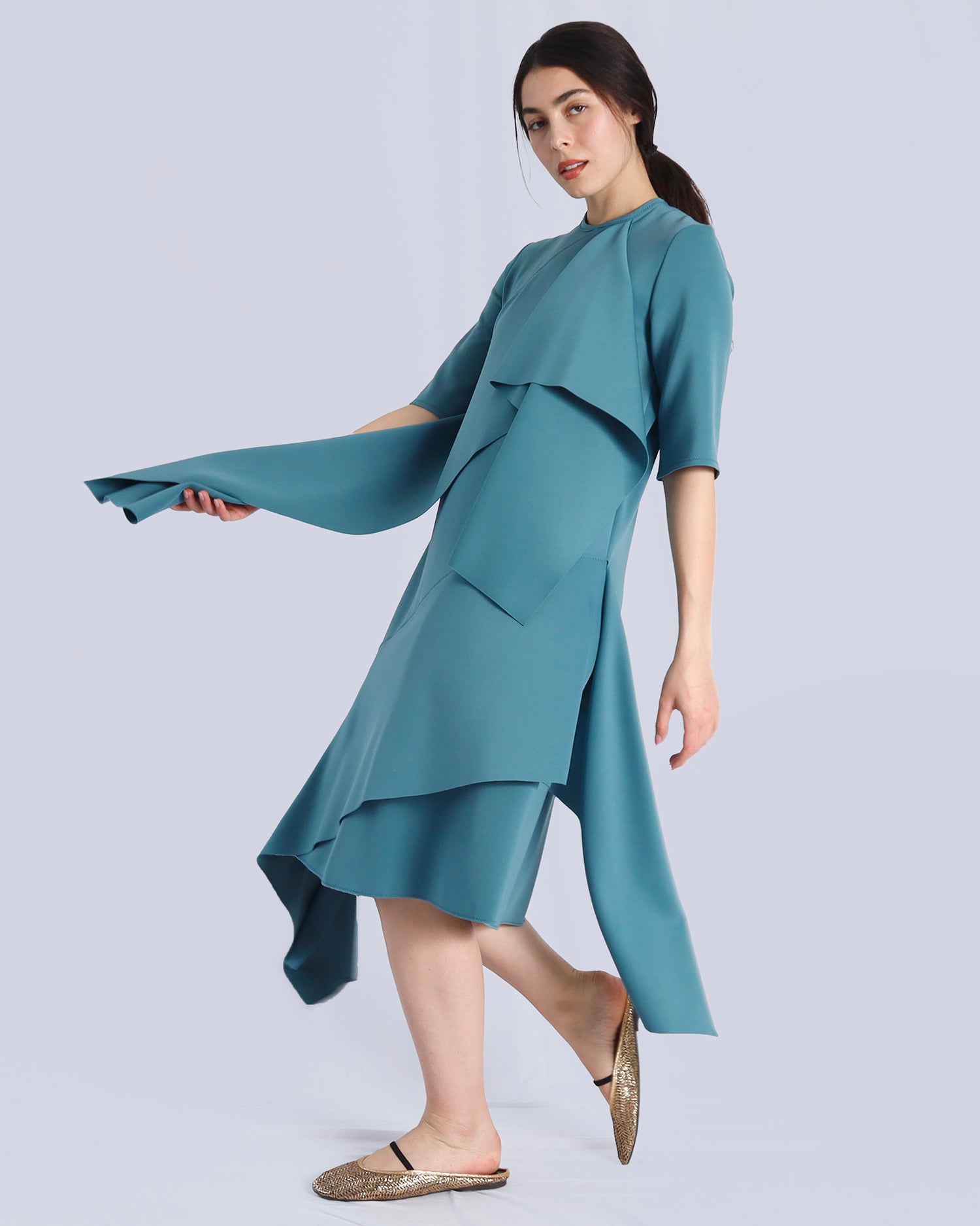 Woman wearing a blue dress with a plain background. Maison Marie Saint Pierre | Dress | PRISCA | Conifer