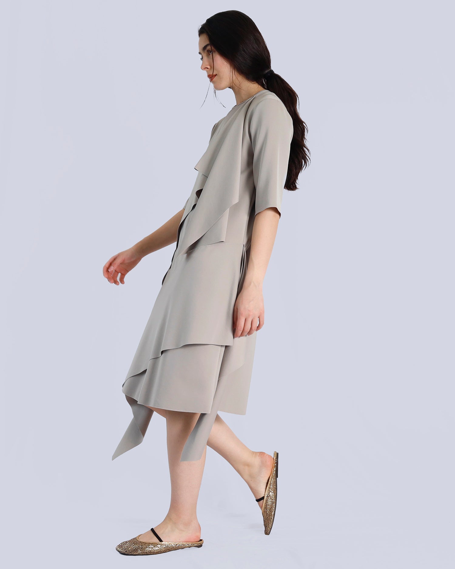 Woman wearing a beige dress on a plain background. Maison Marie Saint Pierre | Dress | PRISCA | Fog