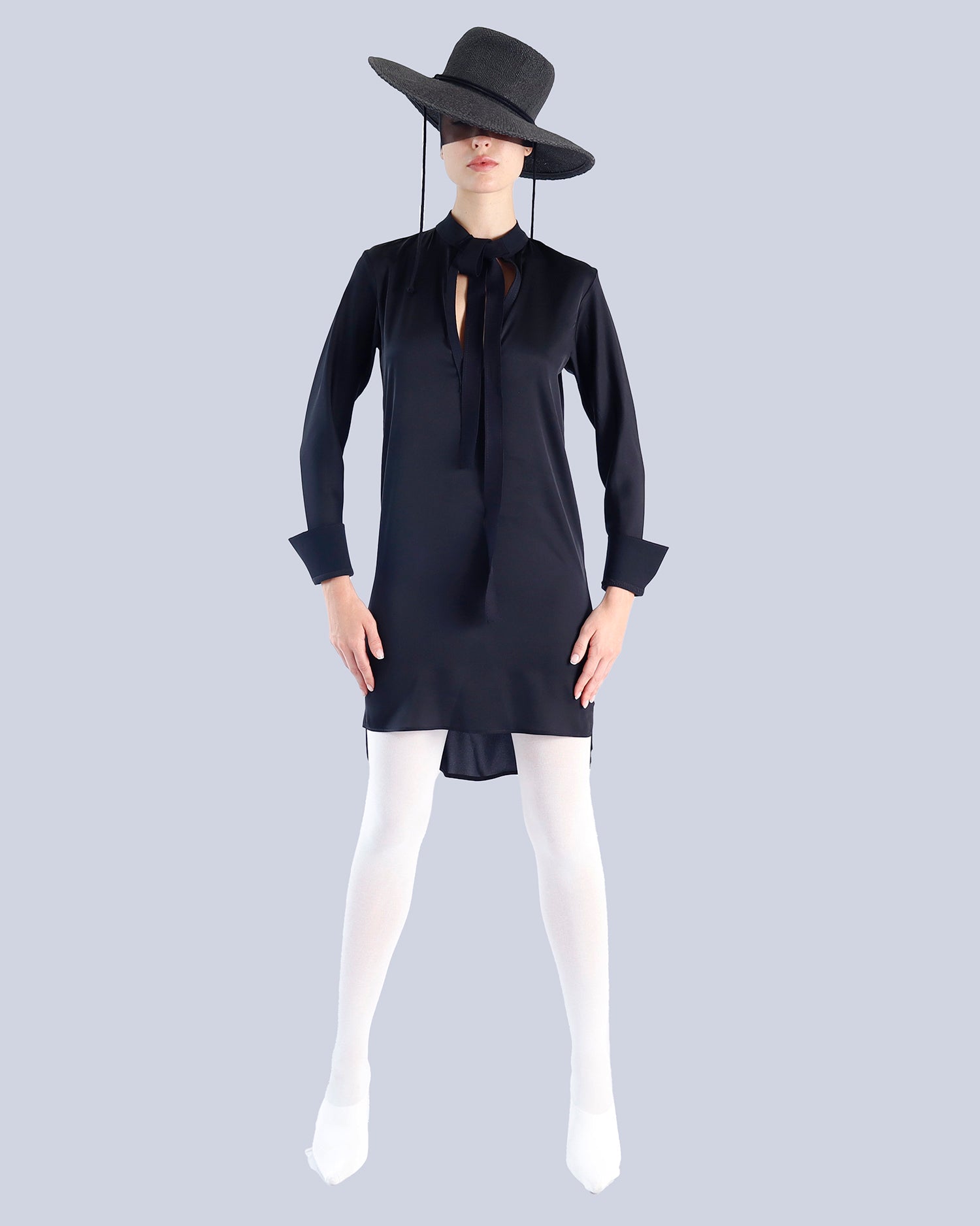 Person wearing a black dress and hat on a gray background. Maison Marie Saint Pierre | Dress | PATTI | Black 