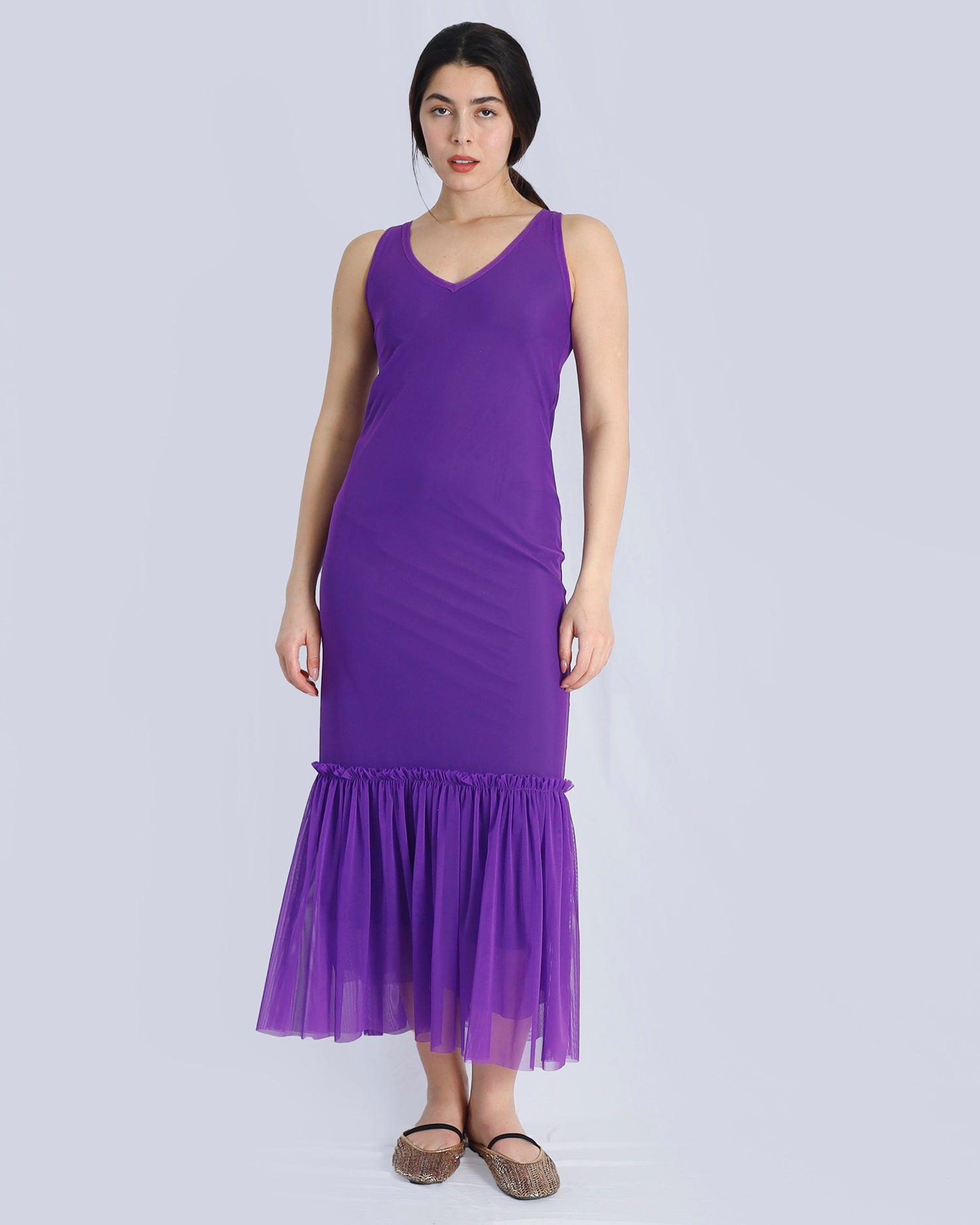 Woman wearing a purple dress with a plain background. Maison Marie Saint Pierre | Dress | POLZIN| Neon Purple