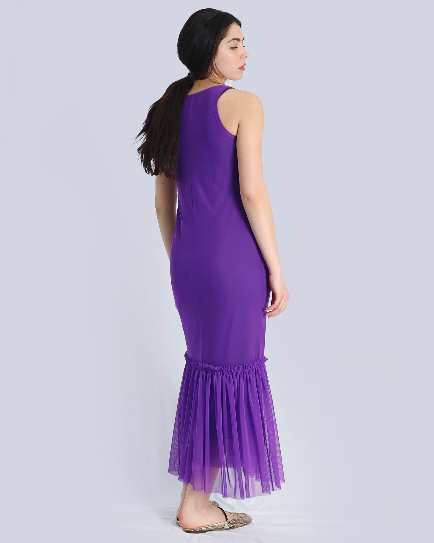 Woman wearing a purple dress with a sheer overlay on a white background. Maison Marie Saint Pierre | Dress | POLZIN| Neon Purple