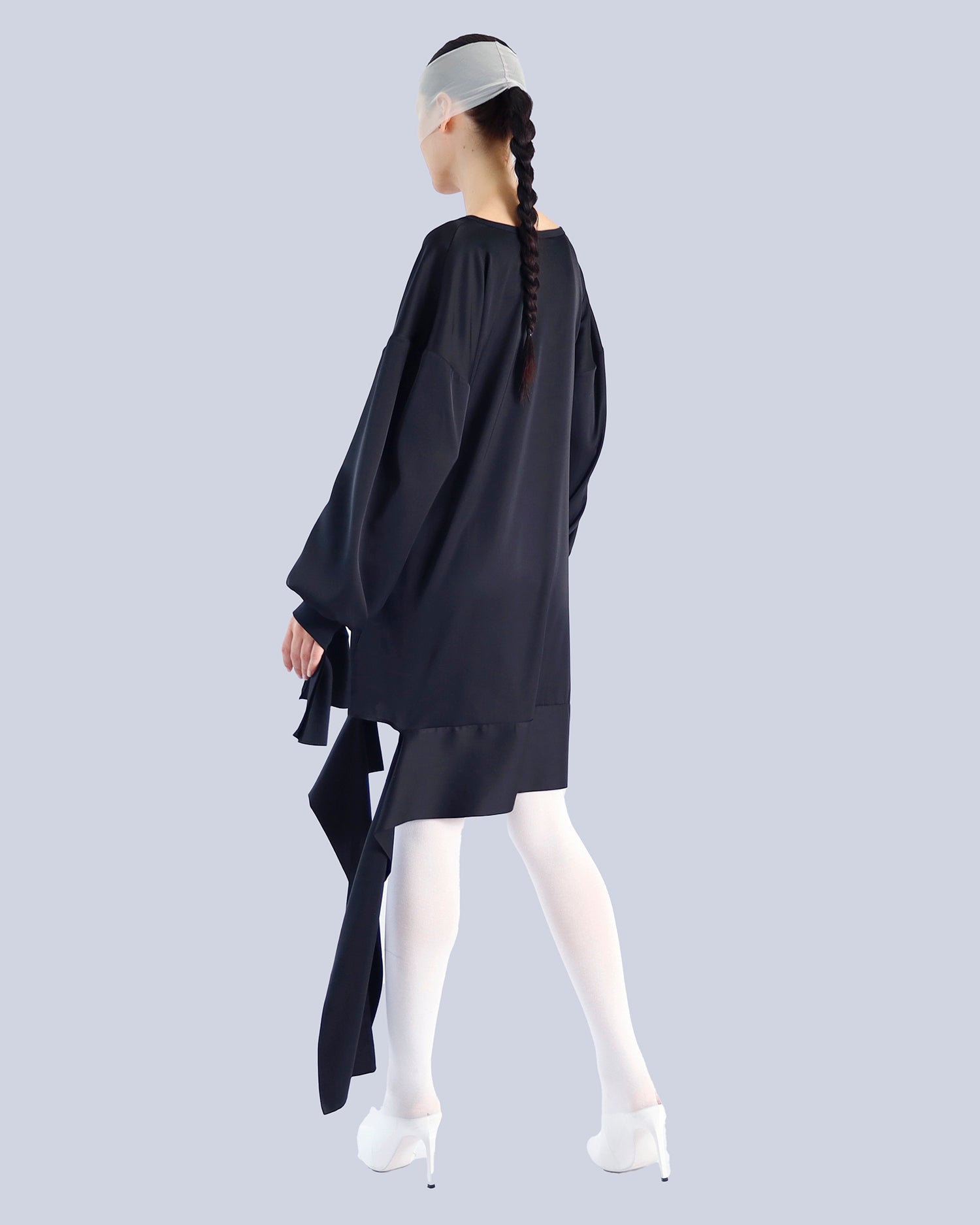 Person wearing a black dress with a white background. Maison Marie Saint Pierre | Tunique | PELLEGRINA | Black 